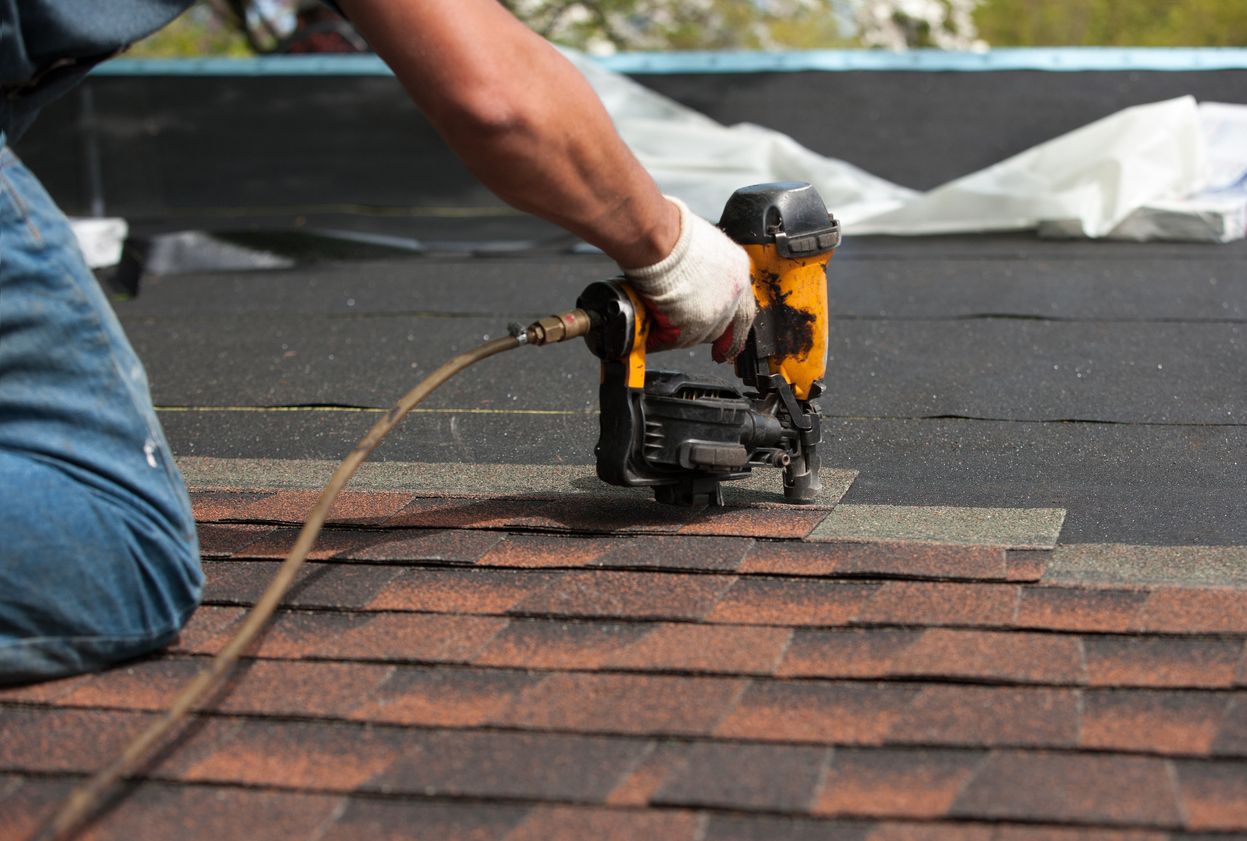 Placeholder for Randy's job photo: nailing a new course of shingles